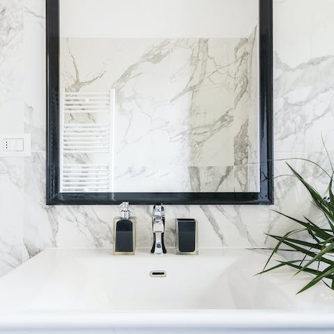The marble-clad bathroom