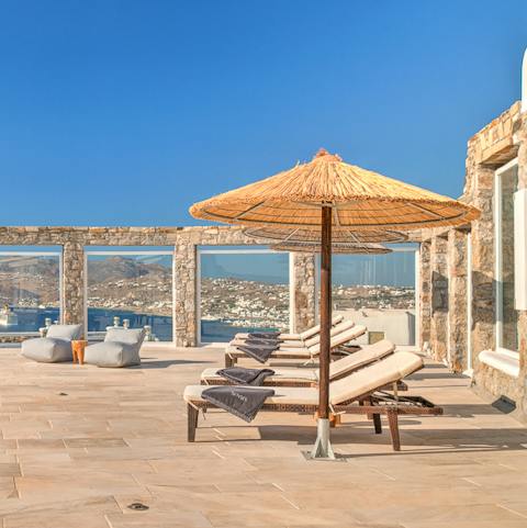 Relax on a sun lounger and get lost in a book for a while