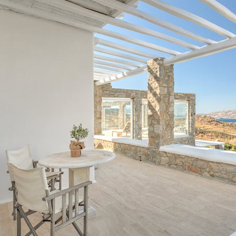 Admire the sea views with a cup of coffee on the balcony