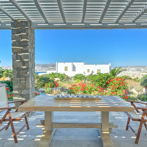 Dine alfresco beside the colourful flowers