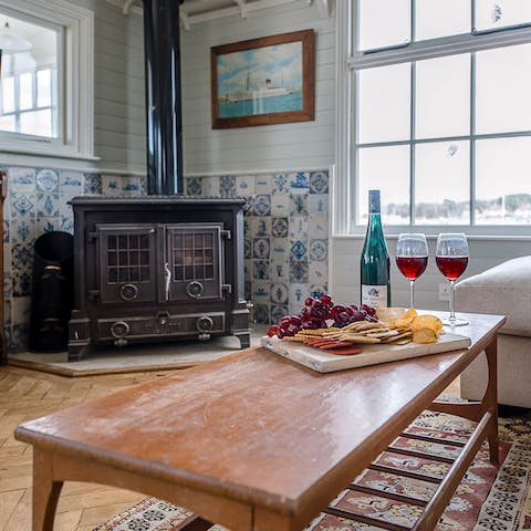 While away an evening sipping wine by the log burner