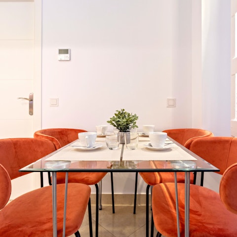 Tuck into fresh juice and pan con tomate around the dining table