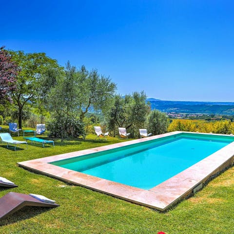 Stretch out by the pool and admire the panoramas