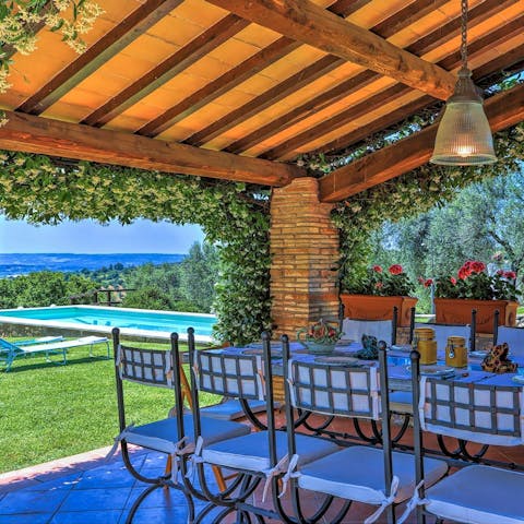 Feast on alfresco dinners under the ivy-covered pergola