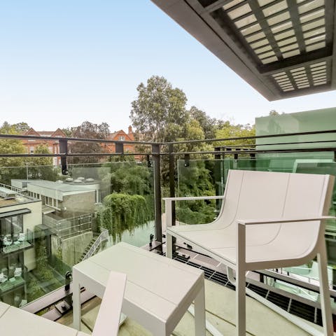 Take your morning coffee or evening drinks onto the balcony