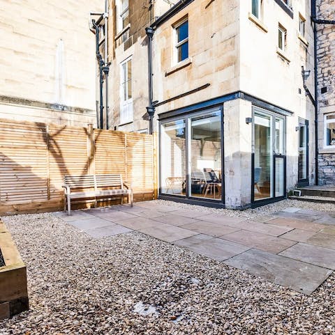 Catch some rays in the private courtyard garden