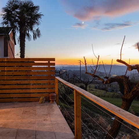 Watch the sunset over the stunning countryside from the private terrace