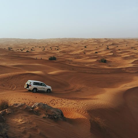 Drive out into the endless desert dunes for a once-in-a-lifetime off-roading experience
