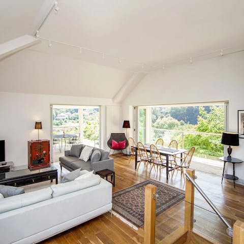 Enjoy views of the green outdoors from the living spaces