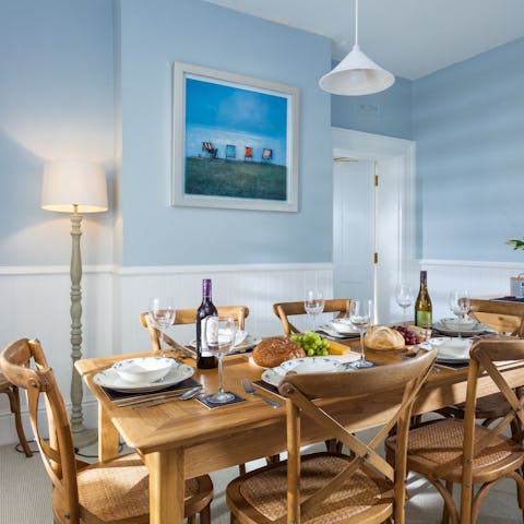 Lay the table for an evening feast in the dedicated dining room