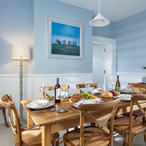 Lay the table for an evening feast in the dedicated dining room