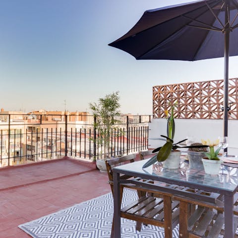 Enjoy alfresco meals on the private terrace, overlooking your 'Esquerra de l’Eixample neighbourhood