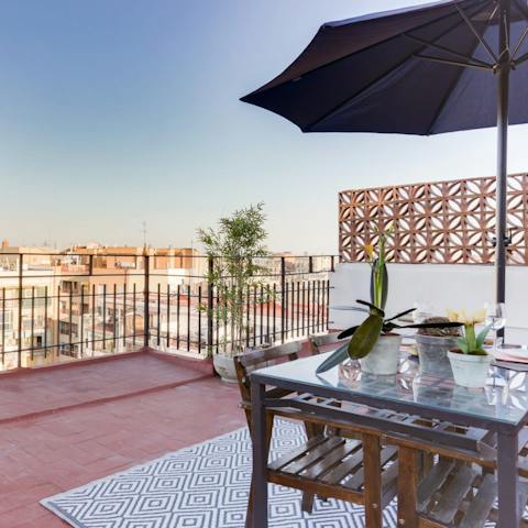 Enjoy alfresco meals on the private terrace, overlooking your 'Esquerra de l’Eixample neighbourhood