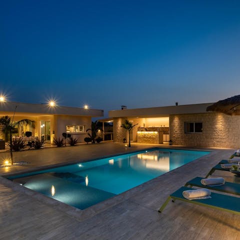 Swim or dine under starry skies