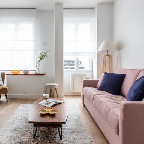 Kick back in the bright living room with a glass of French wine