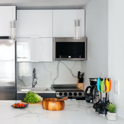 Prepare a tasty lunch in the marble kitchen
