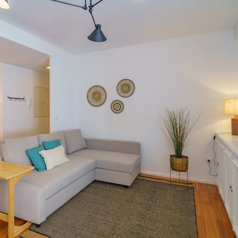 Recline on the plump sofa with a movie or a good book