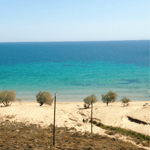 Stretch out on the sand at Tripiti Beach – it's just a five-minute drive away