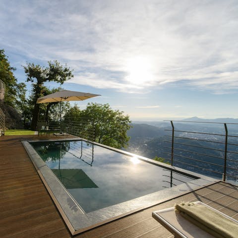 Take in the view of the lake from the private infinity pool
