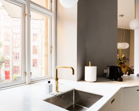 A family-style kitchen with a Quooker