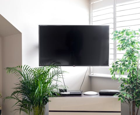 Watch TV in the master bedroom