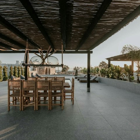 Enjoy meals alfresco by the pool