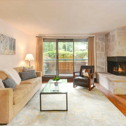 Spend cosy evenings by the fire in the living room