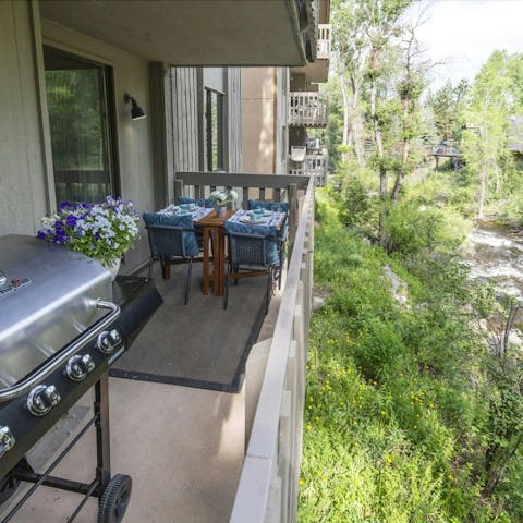 Fire up the grill on the balcony and dine with a river view