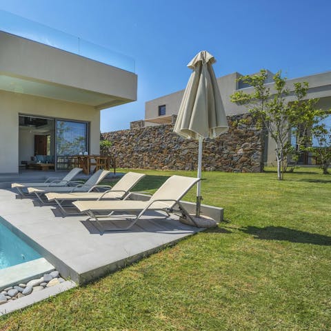 Settle down on a sun lounger with a good book for a peaceful afternoon
