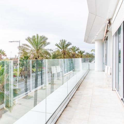 Take a glass of cold sangría out to your private terrace to enjoy sea views