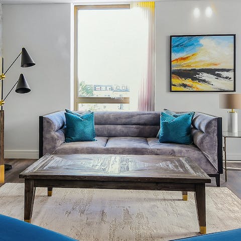 Kick back on the plush velvet sofa after exploring London and unwind in style