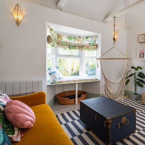 Swing in your hanging hammock chair with a good book to while away the hours