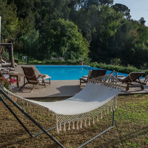 Soak up the sun beside the private pool