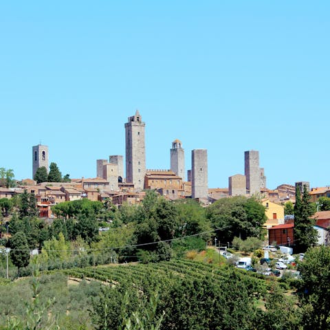 Spend a day discovering the historic charms of San Gimignano – you can drive there