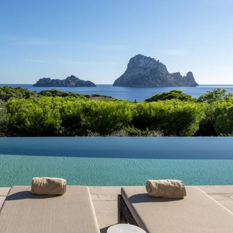 Lay poolside, admiring the breathtaking views