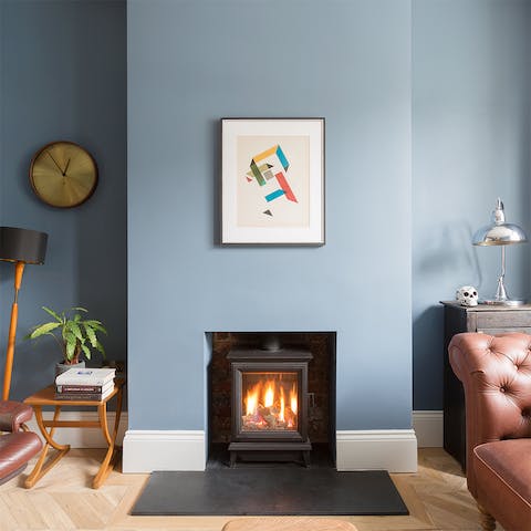 Get cosy by the fireplace