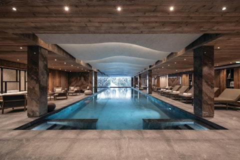 Swim lengths in the 25m pool with mountain views
