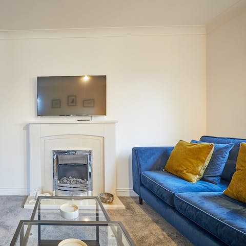 Spend cosy evenings on the velvet sofas