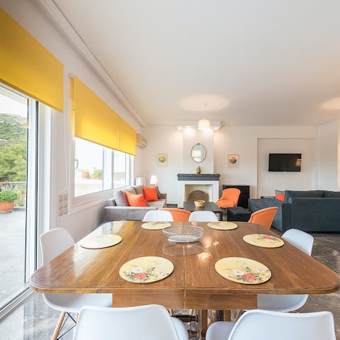 Gather around the wooden table for an array of Greek dips and dishes