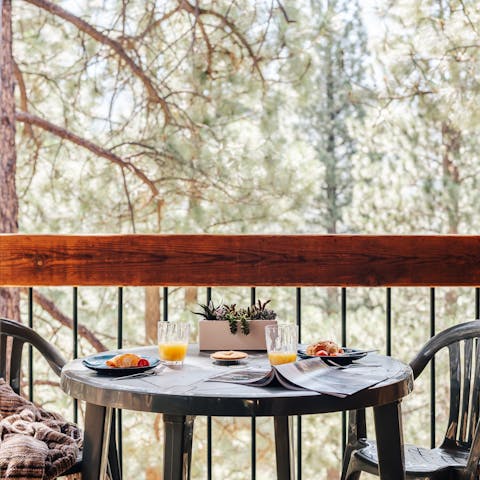 Have breakfast looking out over the forest