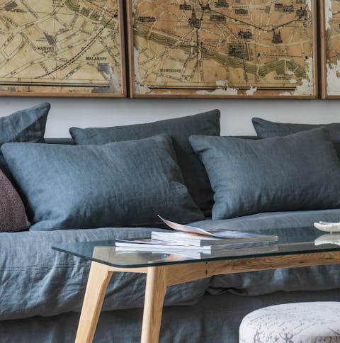 The charcoal blue sofa