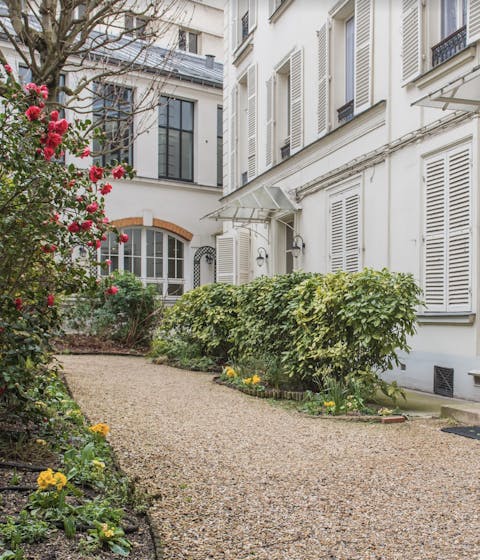 A quaint and flowered courtyard