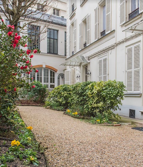 A quaint and flowered courtyard