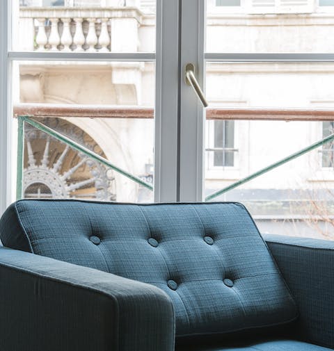 Open up the French doors and relax with a breeze blowing through the space