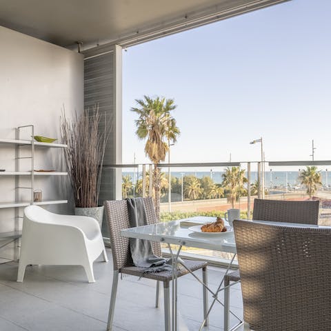 Admire the sea view on the balcony