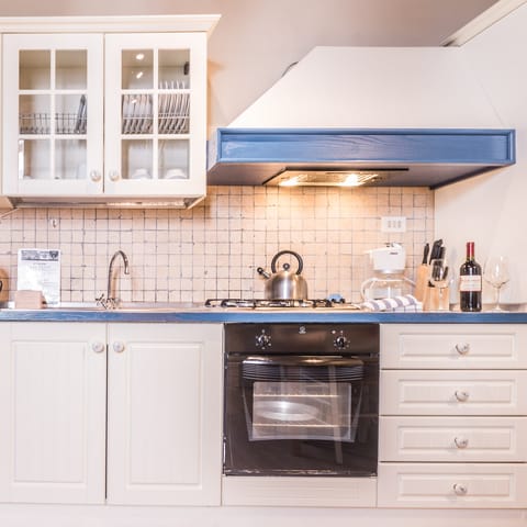 The whitewashed wooden kitchen