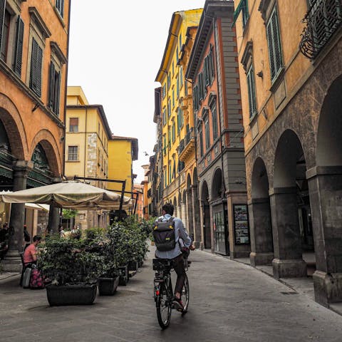 Wind your way through the old streets to a local bar