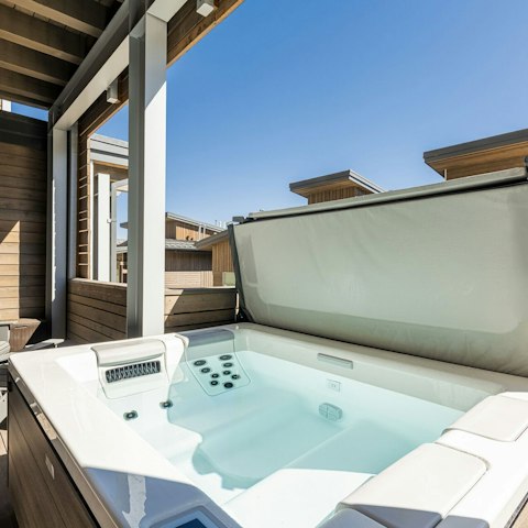 Soak sore muscles in the private hot tub