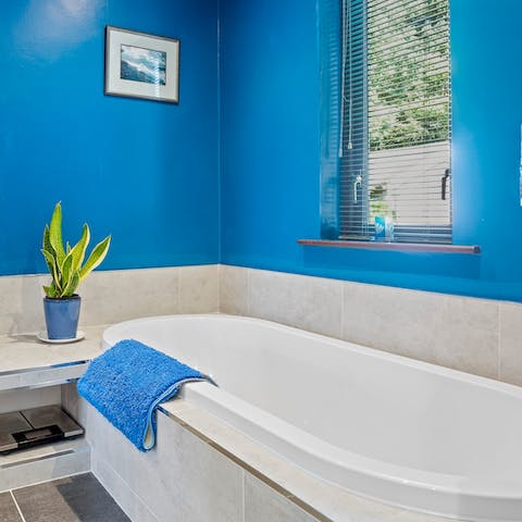 Sink into the bathtub with a glass of wine