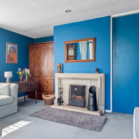Spend a cosy evening by the fireplace after a day of hiking